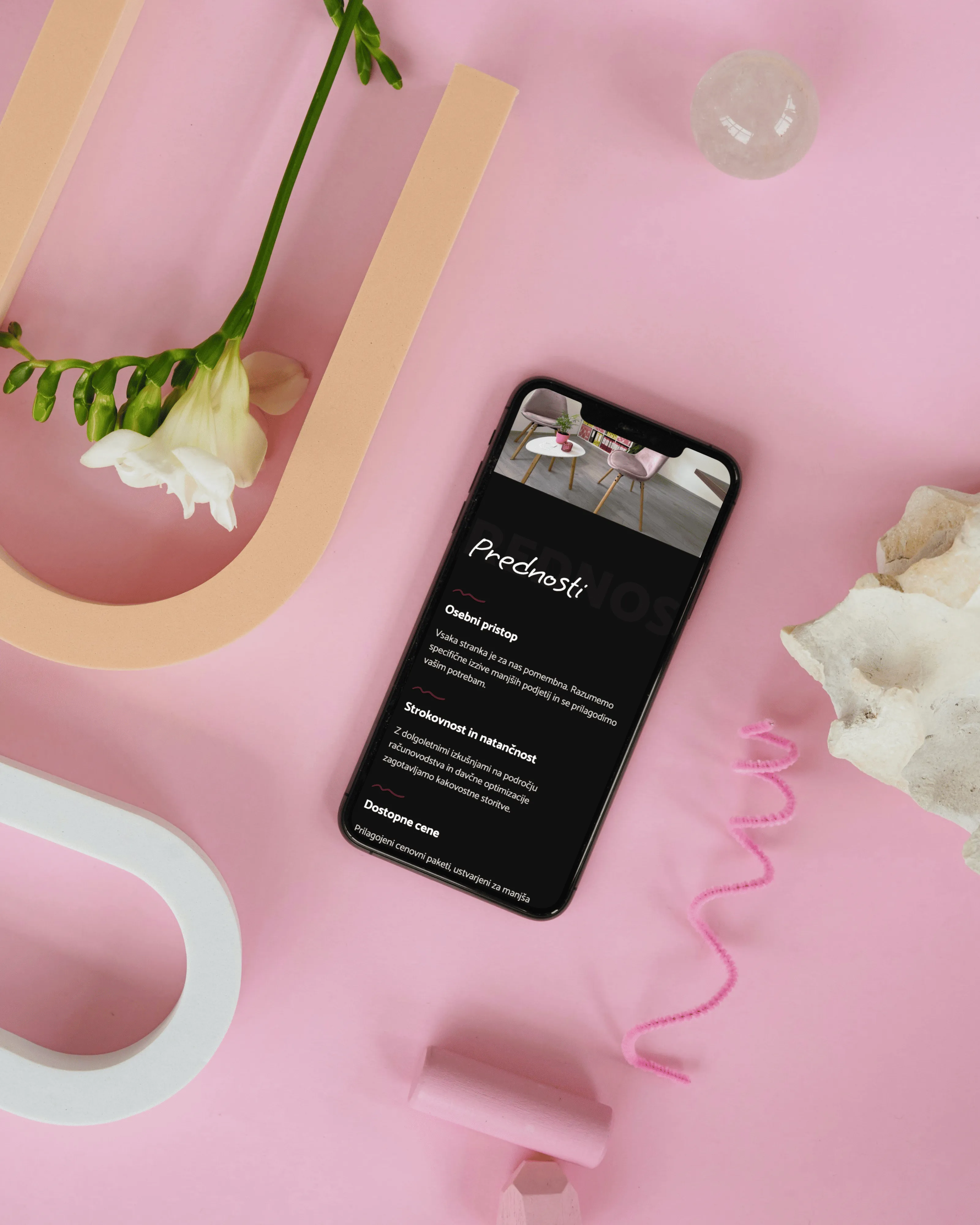 [background image] image of art supplies on a desk (for a graphic design studio)