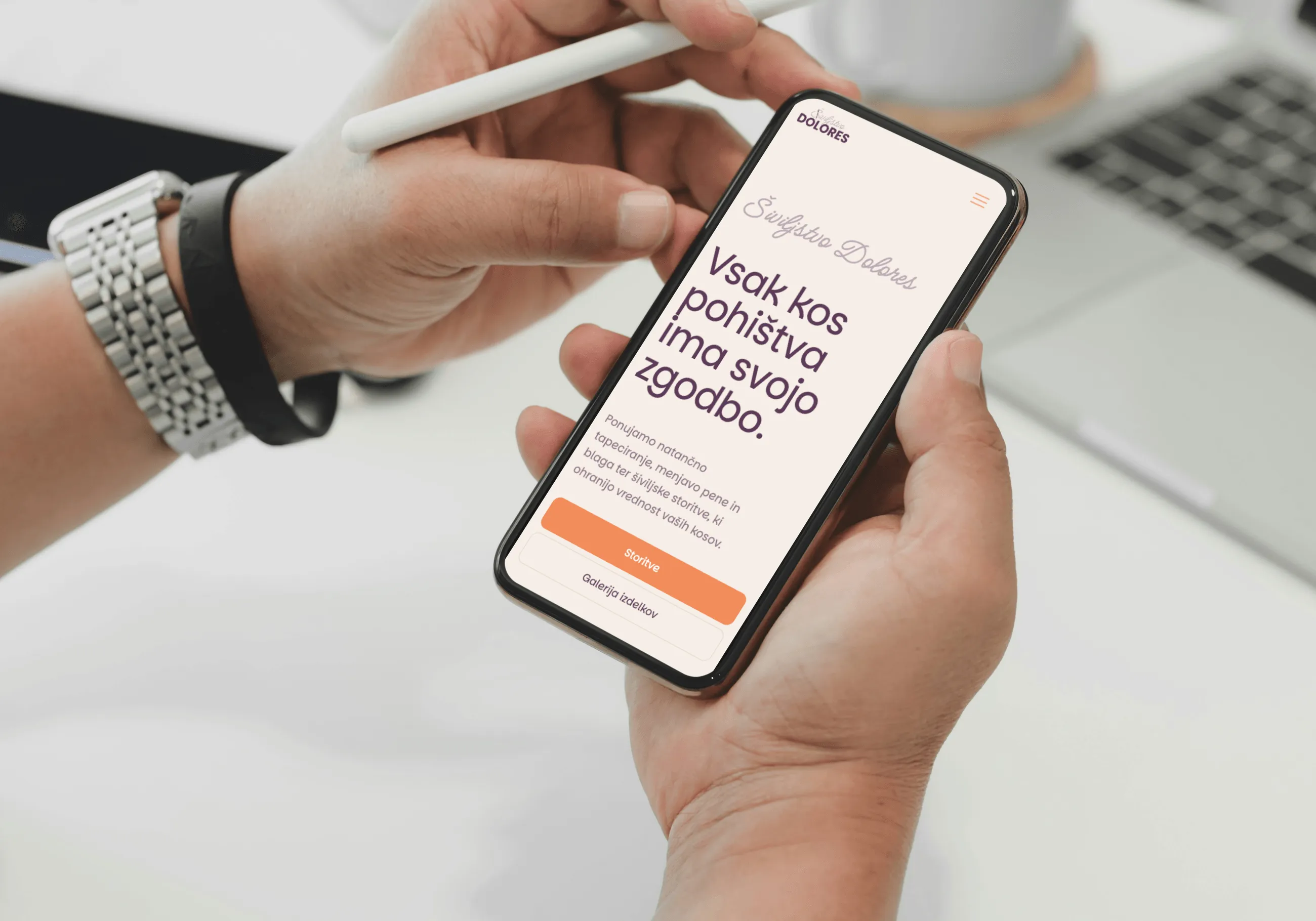 [background image] image of art supplies on a desk (for a graphic design studio)